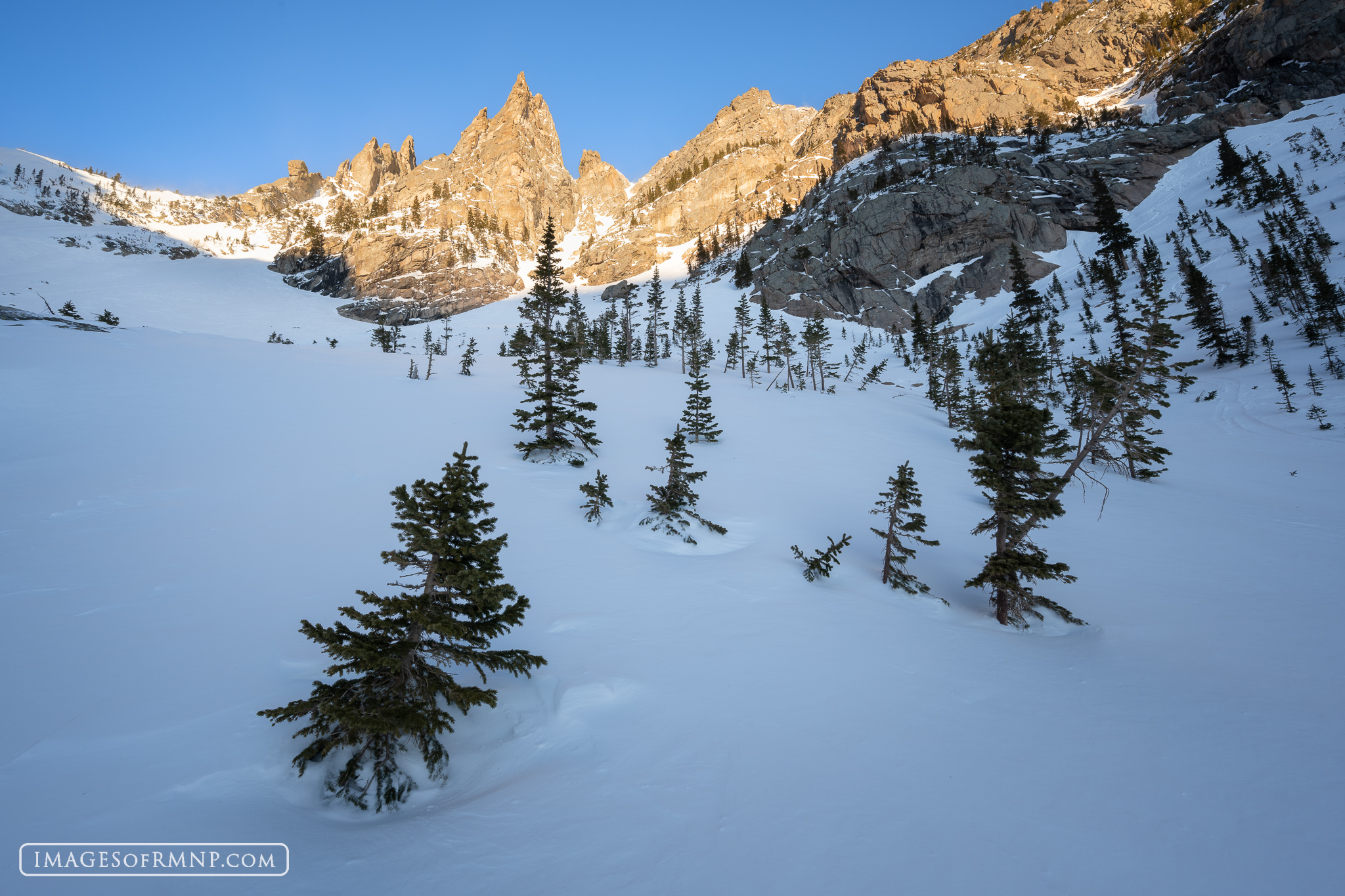 January 31, 2025 The jagged spires of Flattop Mountain stand in stark contrast with its name. Lit by the morning sun, they tower high above the...