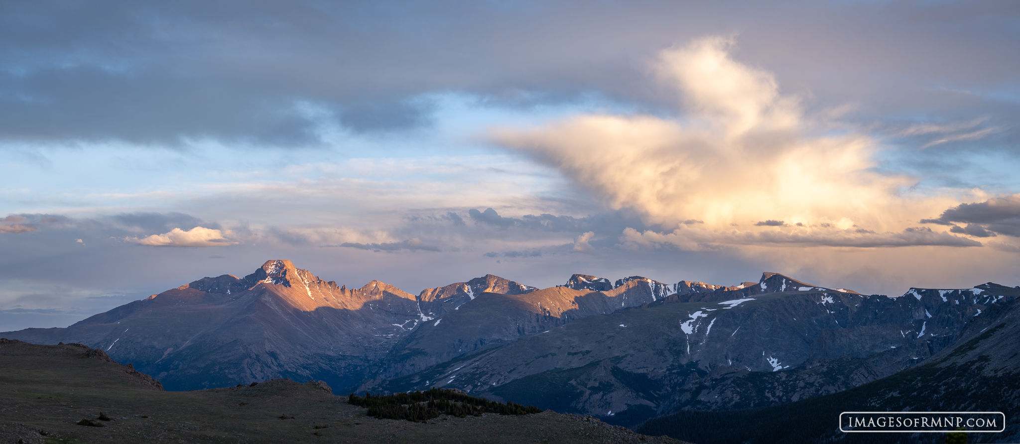 26 June 2026 Longs Peak is illuminated by the last light of the day as seen from up near Forest Canyon Overlook on Trail Ridge Road....
